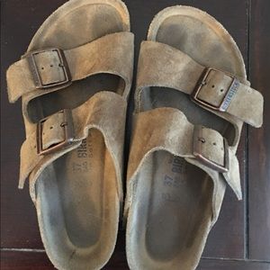 Size 7/37 Birkenstocks with suede straps.